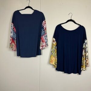 Emerald size large set of 2 beautiful shirts. Back out. See through euc